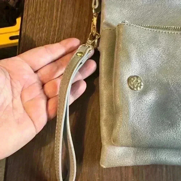 Grey Fold over Purse. Wristlet Strap. Shoulder Strap. Pockets. Zipper. Snap. - Picture 2 of 7